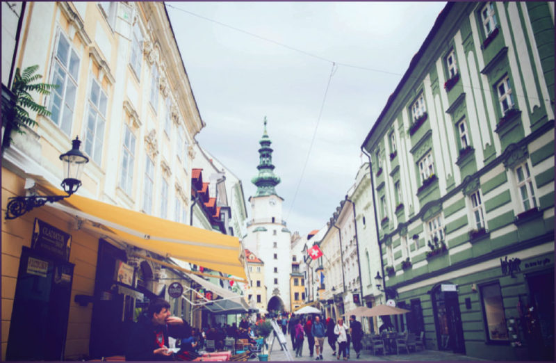 The charming streets of Bratislava with Michael’s Gate standing tall at the back