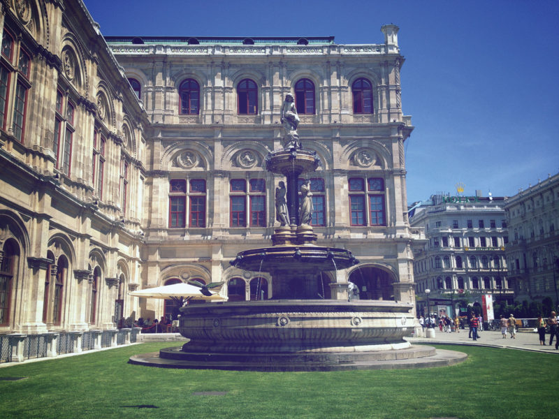 Marble fountain in front of Opera House in Vienna, decorated with a Statue of Lorelei, a siren who sings alluring songs of longing and grief
